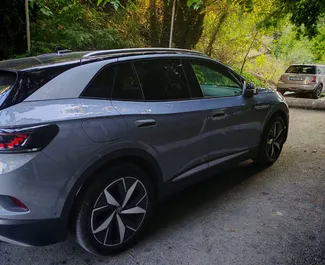 Wynajmij Volkswagen ID4 2023 w Gruzji. Paliwo: Elektryczność. Moc: 465 KM ➤ Koszt od 235 GEL za dobę.