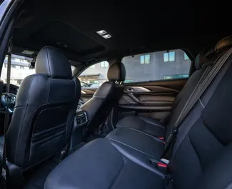 Wnętrze Mazda CX-9 do wynajęcia w Gruzji. Doskonały samochód 7-osobowy. ✓ Skrzynia Automatyczna.