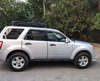 Wynajmij Ford Escape 2009 w Gruzji. Paliwo: Hybryda. Moc: 190 KM ➤ Koszt od 80 GEL za dobę.