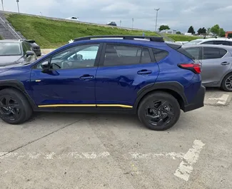 Wynajmij Subaru Crosstrek 2024 w Gruzji. Paliwo: Benzyna. Moc: 100 KM ➤ Koszt od 145 GEL za dobę.