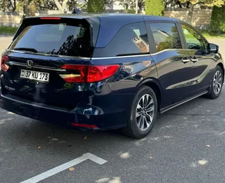 Wynajmij Honda Odyssey 2023 w Armenii. Paliwo: Benzyna. Moc: 280 KM ➤ Koszt od 100 USD za dobę.