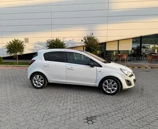 Wynajmij Opel Corsa 2015 w Albanii. Paliwo: Benzyna. Moc:  KM ➤ Koszt od 27 EUR za dobę.