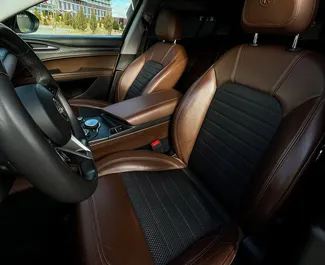 Alfa Romeo Stelvio Quadrifoglio – samochód kategorii Komfort, SUV, Crossover na wynajem na Białorusi ✓ Depozyt 200 USD ✓ Ubezpieczenie: OC, CDW.