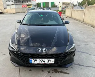 Wynajmij Hyundai Elantra 2023 w Gruzji. Paliwo: Benzyna. Moc: 147 KM ➤ Koszt od 49 GEL za dobę.