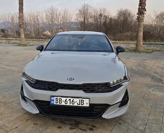 Wynajmij Kia K5 2021 w Gruzji. Paliwo: Benzyna. Moc: 180 KM ➤ Koszt od 165 GEL za dobę.