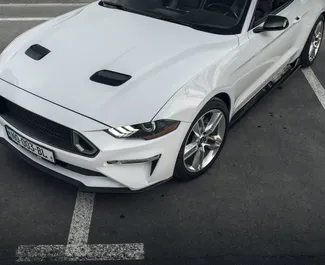 Wynajem samochodu Ford Mustang GT Cabrio nr 15474 (Automatyczna) w Tbilisi, z silnikiem 2,3l. Benzyna ➤ Bezpośrednio od Kate w Gruzji.
