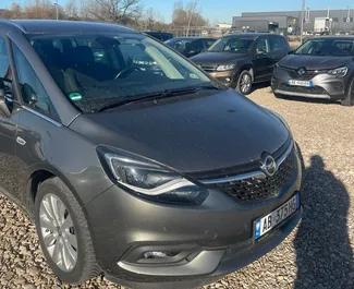 Wynajem samochodu Opel Zafira nr 15429 (Automatyczna) na lotnisku w Tiranie, z silnikiem 1,6l. Benzyna ➤ Bezpośrednio od Marenglen w Albanii.