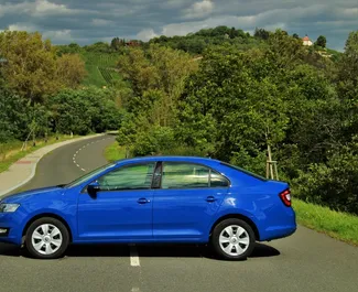 Wynajmij Skoda Rapid 2019 na Węgrzech. Paliwo: Benzyna. Moc: 110 KM ➤ Koszt od 25 EUR za dobę.