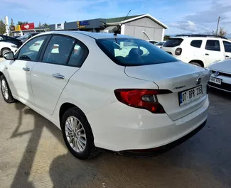 Wynajmij Fiat Egea 2023 w Turcji. Paliwo: Benzyna. Moc: 95 KM ➤ Koszt od 17 USD za dobę.