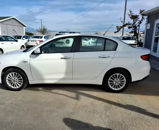 Wynajem samochodu Fiat Egea nr 6545 (Manualna) na lotnisku w Antalyi, z silnikiem 1,4l. Benzyna ➤ Bezpośrednio od Ramazan w Turcji.