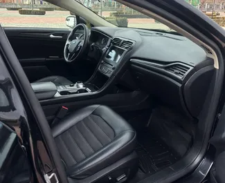 Wynajmij Ford Fusion Sedan 2017 w Armenii. Paliwo: Benzyna. Moc: 175 KM ➤ Koszt od 35 USD za dobę.