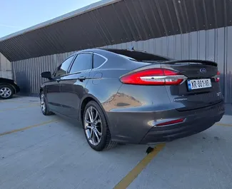 Wynajem samochodu Ford Fusion Sedan nr 15700 (Automatyczna) w Tbilisi, z silnikiem 2,0l. Hybryda ➤ Bezpośrednio od Zurab w Gruzji.
