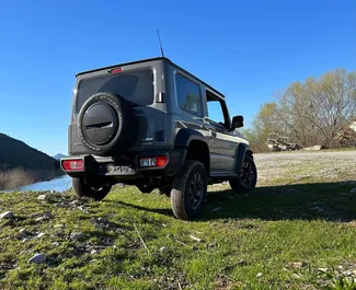 Wynajmij Suzuki Jimny 2023 w Czarnogórze. Paliwo: Benzyna. Moc: 105 KM ➤ Koszt od 28 EUR za dobę.