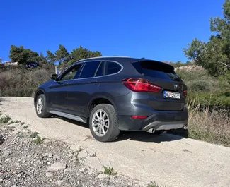 Wypożyczalnia BMW X1 na lotnisku w Podgoricy, Czarnogóra ✓ Nr 15686. ✓ Skrzynia Automatyczna ✓ Opinii: 0.