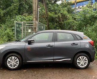 Wynajem samochodu Suzuki Baleno nr 16225 (Automatyczna) na lotnisku w Goa, z silnikiem 1,2l. Benzyna ➤ Bezpośrednio od Umar w Goa.
