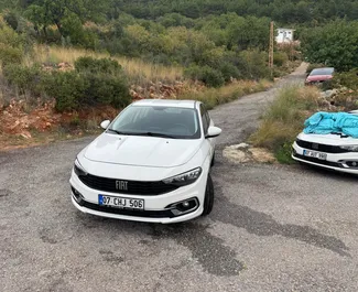 Wynajmij Fiat Egea 2024 w Turcji. Paliwo: Benzyna. Moc: 90 KM ➤ Koszt od 40 USD za dobę.