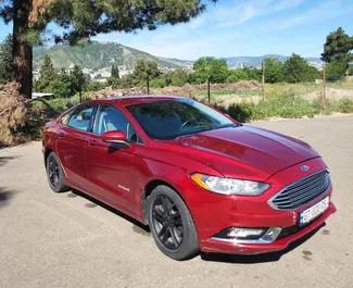 Wynajmij Ford Fusion Sedan 2018 w Gruzji. Paliwo: Benzyna. Moc: 188 KM ➤ Koszt od 110 GEL za dobę.