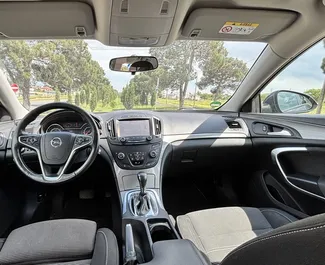 Wnętrze Opel Insignia Combi do wynajęcia w Gruzji. Doskonały samochód 5-osobowy. ✓ Skrzynia Automatyczna.
